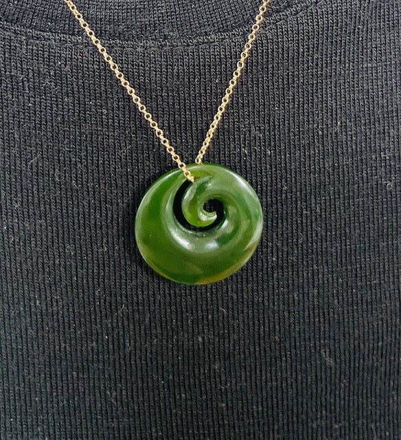 Koru necklace meaning sales