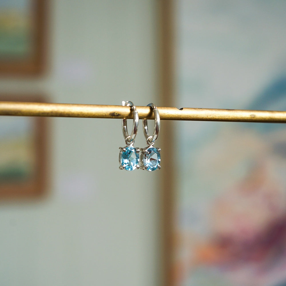 
                  
                    Blue Topaz Oval Earrings
                  
                